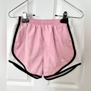 Pink Nike running shorts